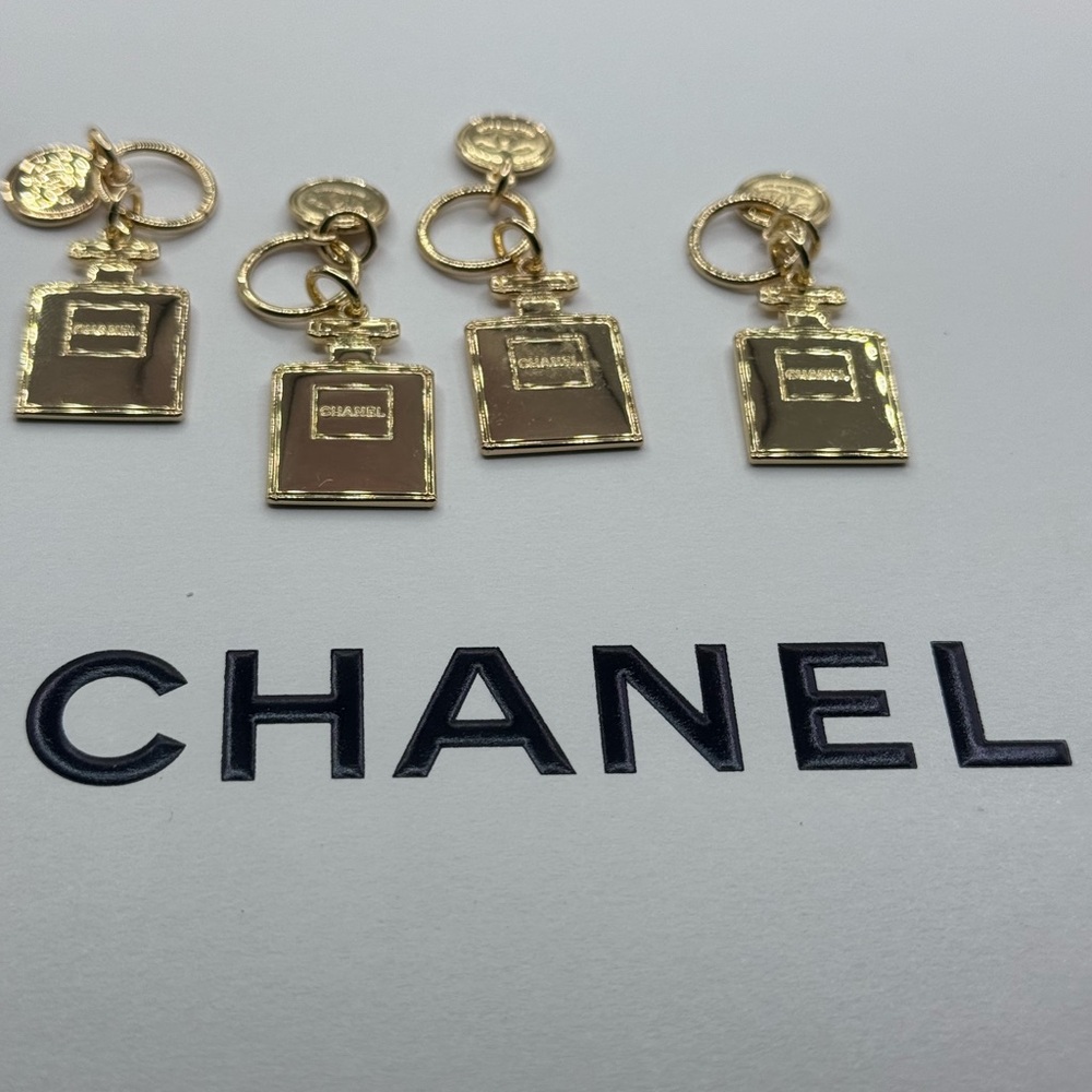 Set of 4 Chanel charms